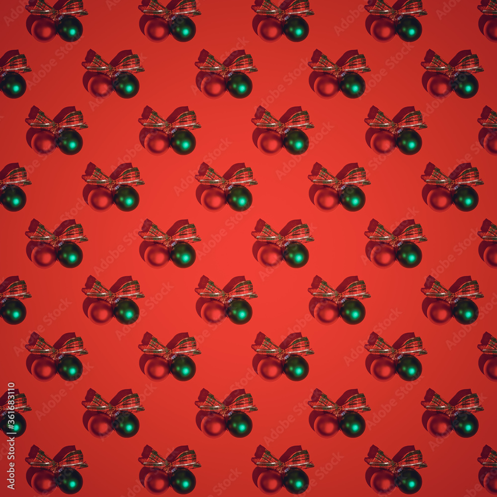 Red Christmas pattern. Red and green satin glass Christmas bulbs on red background Red Christmas pattern. Red and green satin glass Christmas bulbs on red background