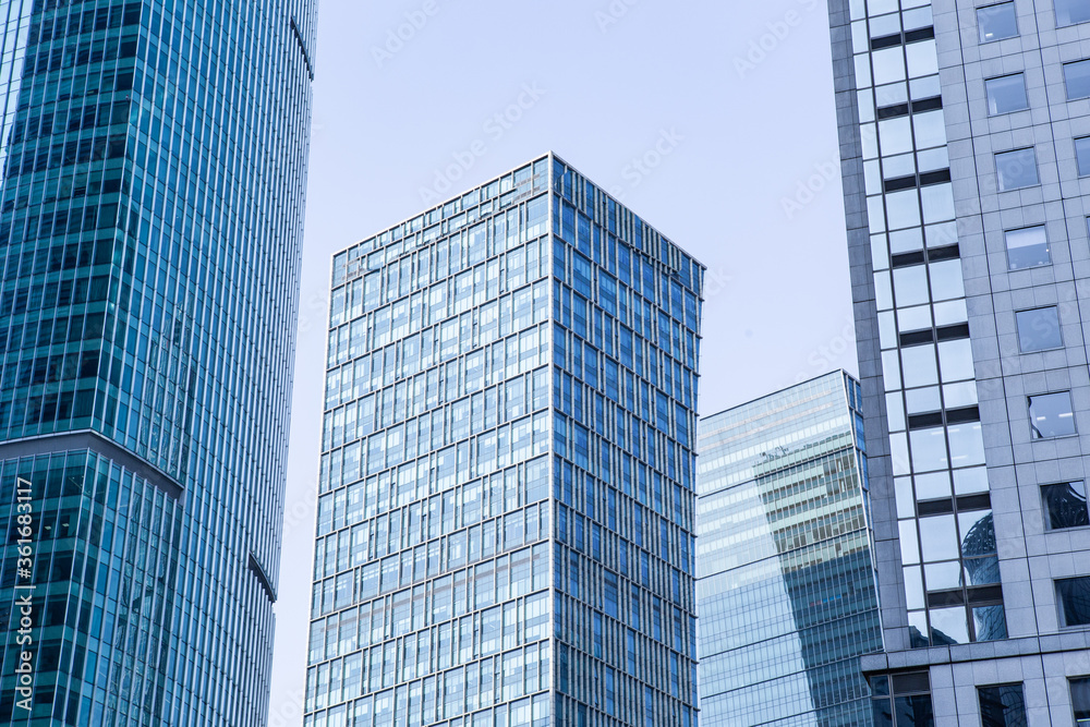 Modern skyscraper in Shanghai, with blue sky in the back. Modern skyscraper in Shanghai, with blue sky in the back.