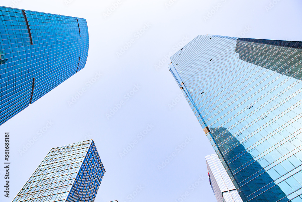 Modern skyscraper in Shanghai, with blue sky in the back. Modern skyscraper in Shanghai, with blue sky in the back.