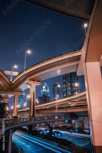 nNight view of the traffic under a overpass bridge in Shanghai  China.