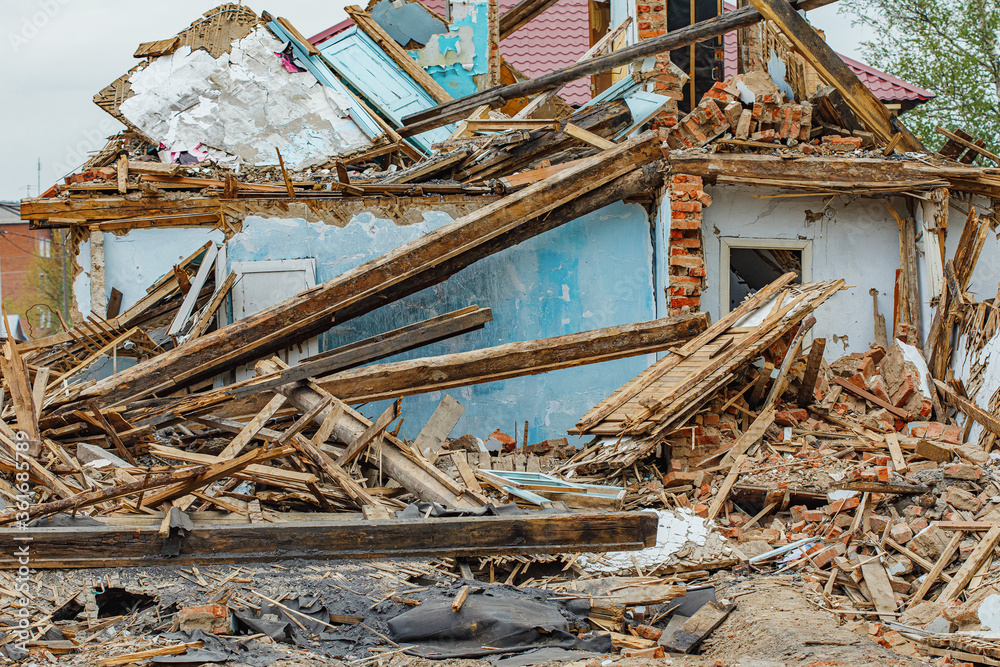 Rubble of old ruined house. Pile of construction fragments Rubble of old ruined house. Pile of construction fragments