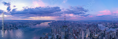 Panorama view of the Skyline of Manhattan in sunset day, New York City, United States. Shot from Hudson River 