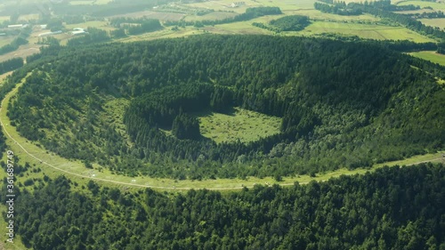 Drone shooting a huge crater that has become a forest. Abu Oreum, Jeju Island.