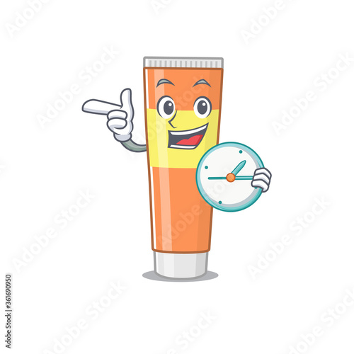 A picture of cheery toothpaste holding a clock