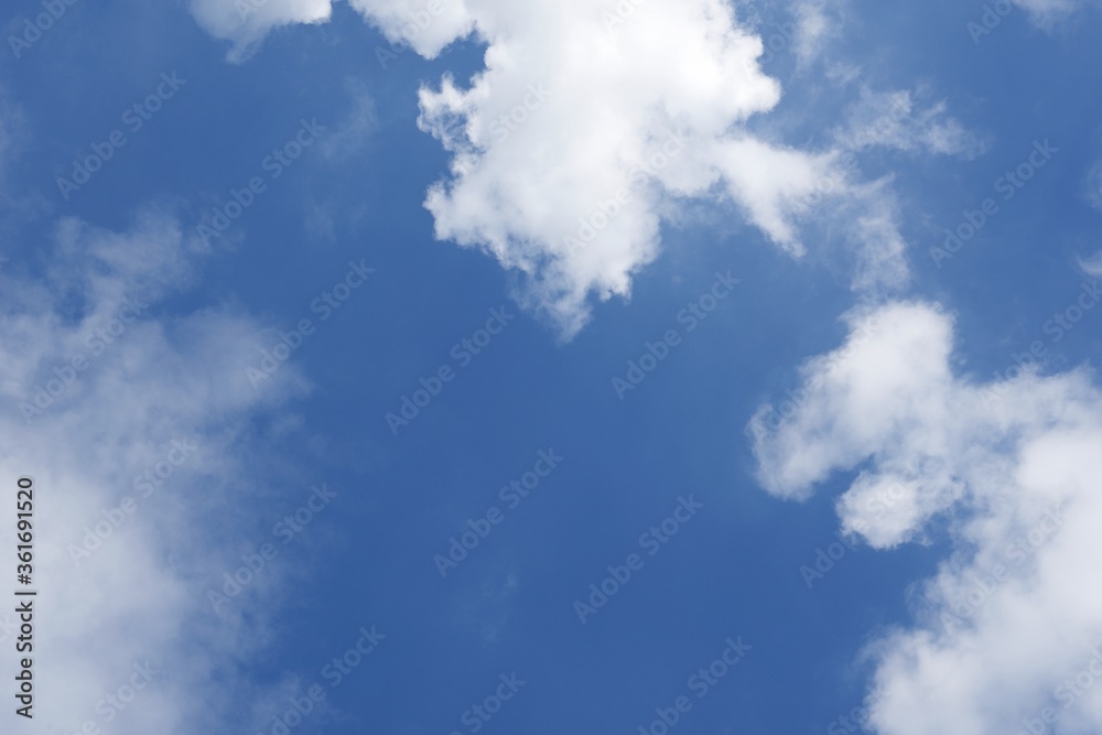 Fototapeta premium Blue sky with white clouds background of good environment 