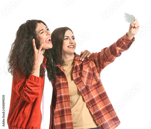 Young women taking selfie o...