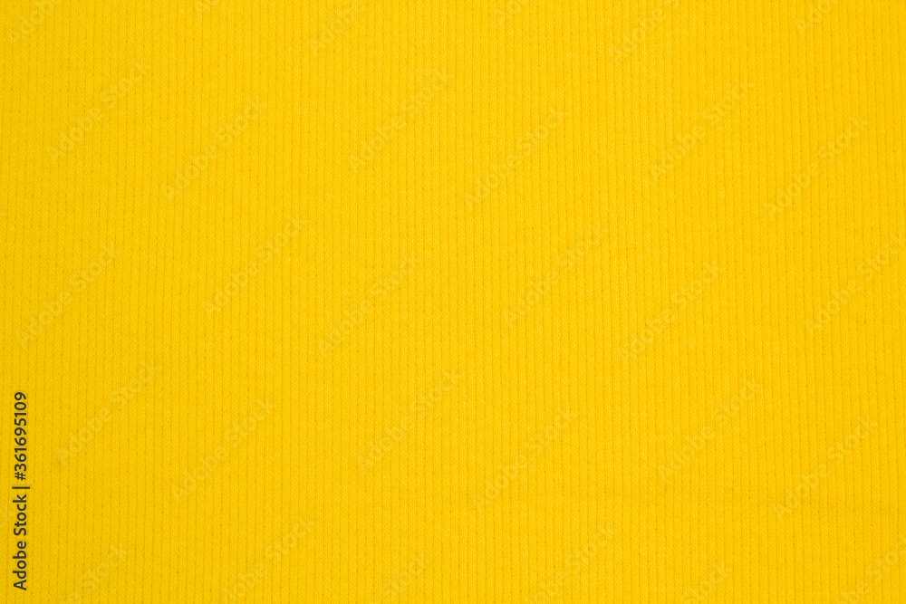 Fabric suit fold top view. Yellow textile	
