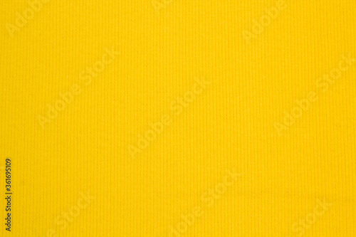 Fabric suit fold top view. Yellow textile 