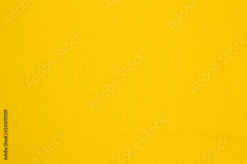 Bild auf Leinwand Fabric suit fold top view. Yellow textile