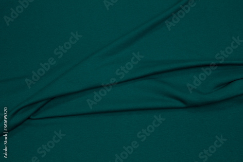 Fabric cotton fold, top view. Blue textile 