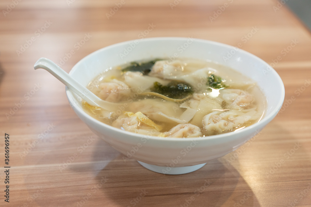 Wonton soup, Chinese traditional food with boiled meat filled wonton and seaweed soup. Wonton soup, Chinese traditional food with boiled meat filled wonton and seaweed soup.