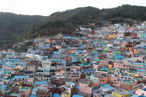 Gamcheon Culture Village which is houses built in staircase-fashion on the foothills of a coastal mountain during sunset in autumn, Busan, South Korea © Crystaltmc