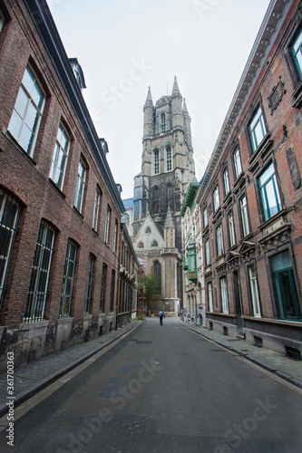 Street to Ghent cathedral along with the medieval architecture building in Ghent Belgium