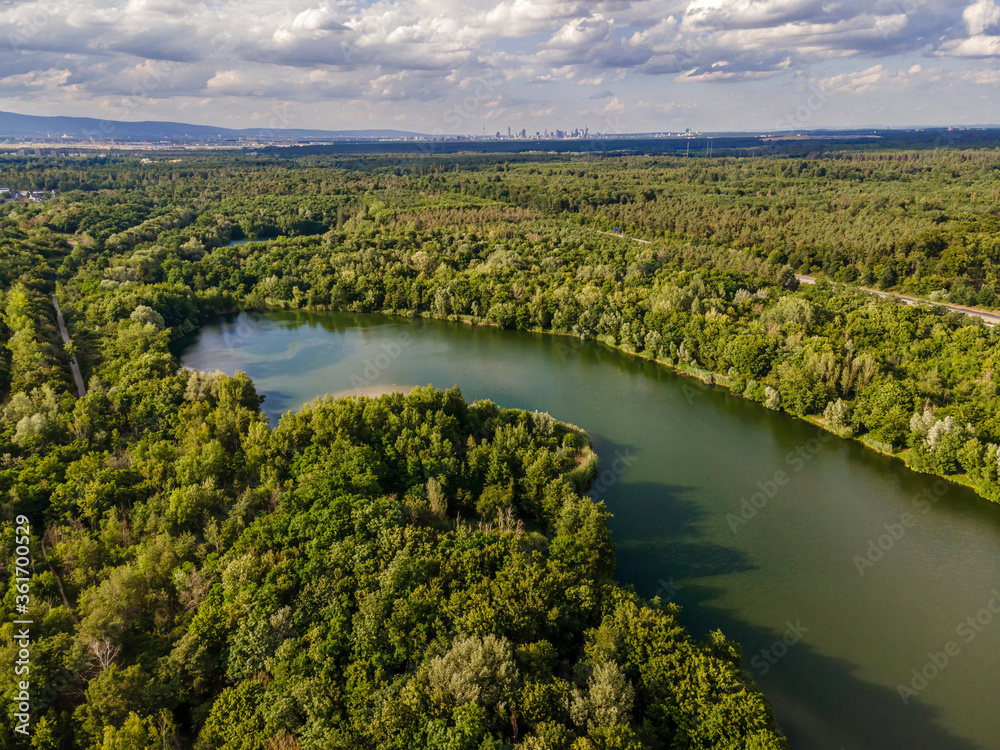 Fototapeta premium Aerial view of the lake called Oberwaldsee next to Darmstadt, Germany.