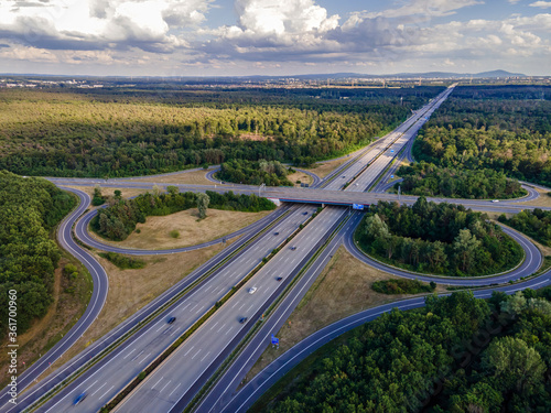 The highway intersection of the highway 5 between Frankfurt and Darmstadt in Germany at a cloudy and windy day in summer. photo