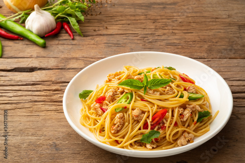 stir fried spicy spaghetti with minced chicken and basil,Pad Kra Pao