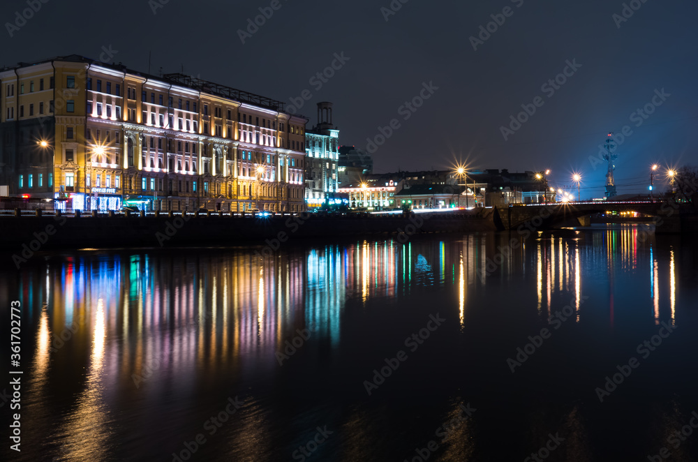 Moscow embankment and illuminated buildings at night