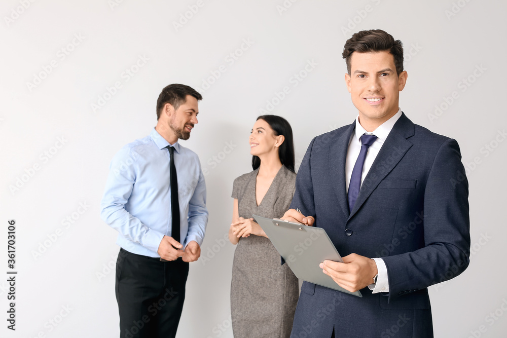 Group of business people on light background