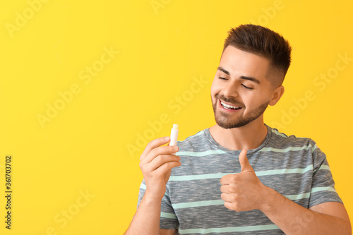 Handsome young man with lip...