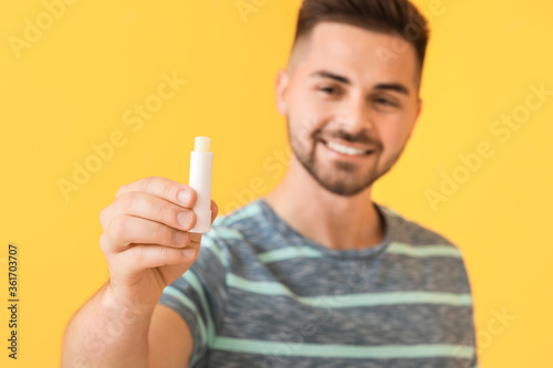 Handsome young man with lip...