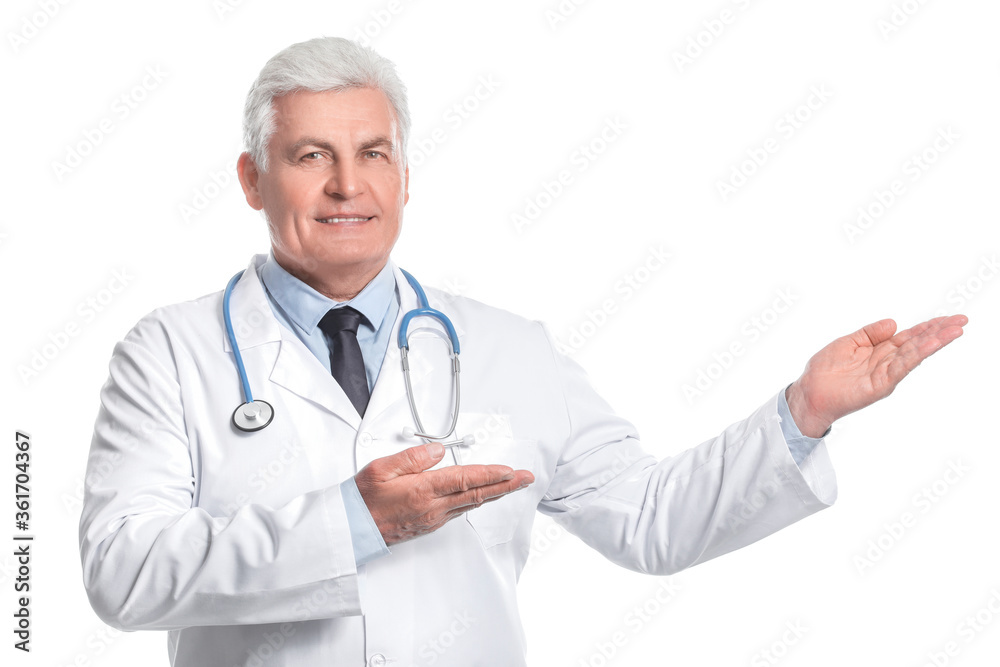 Portrait of senior doctor showing something on white background Portrait of senior doctor showing something on white background