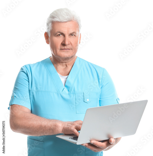 Portrait of senior doctor with laptop on white background