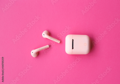 pink bright headphones on a pink background