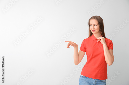 Beautiful young woman in st...