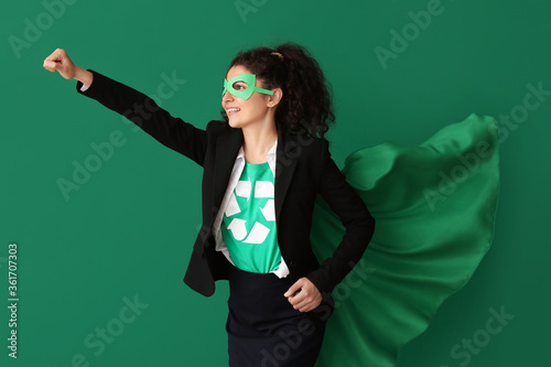 Woman dressed as eco superh...