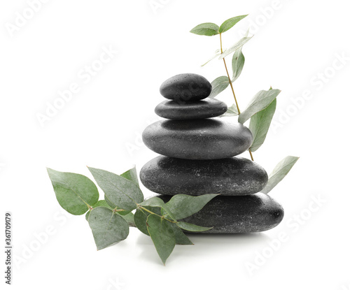 Spa stones on white background