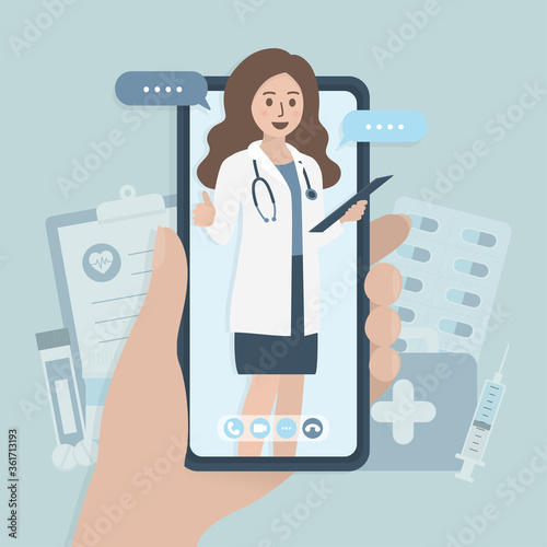 Smartphone in hand, female doctor showing thumb up on mobile phone screen. Online doctor, medical consultation application and healthcare concept.