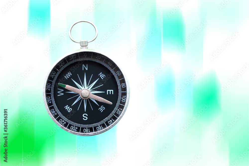 round compass on background of another compass as symbol of tourism with compass, travel with compass and outdoor activities round compass on background of another compass as symbol of tourism with compass, travel with compass and outdoor activities
