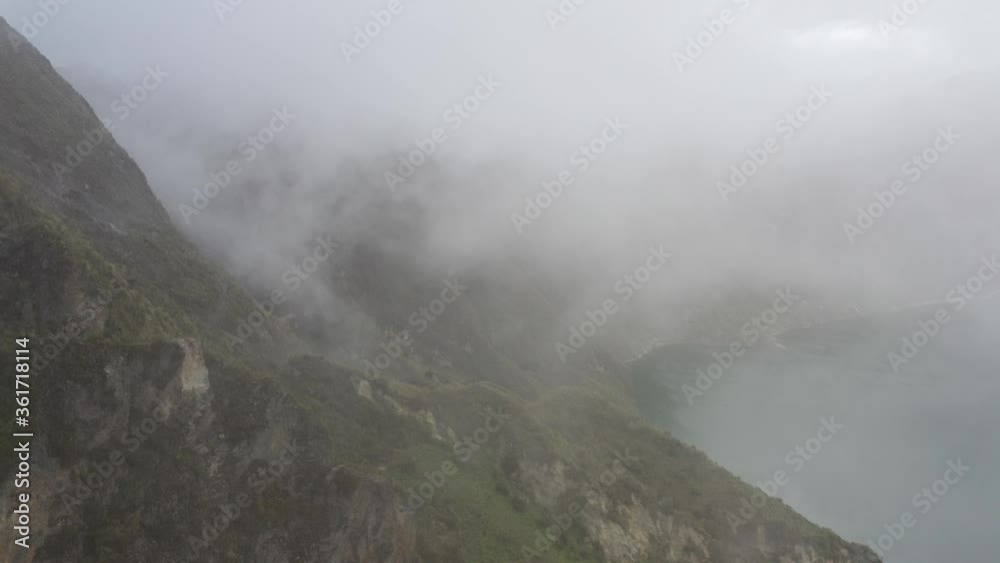 Still video showing the clouds coming in from the topside of a large hill and heading down towards a lake
Still video showing the clouds coming in from the topside of a large hill and heading down towards a lake