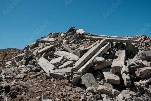 pile of concrete rubble from demolished building ruil to recycle construcion material