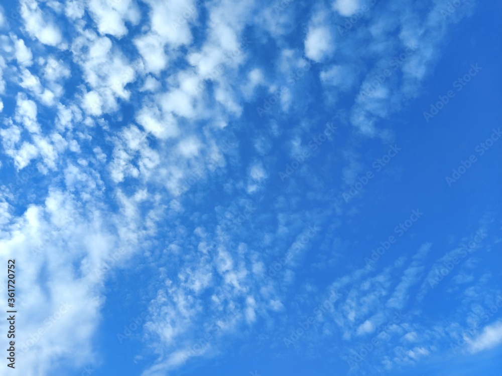 White clouds, indigo blue, colorful, natural background.