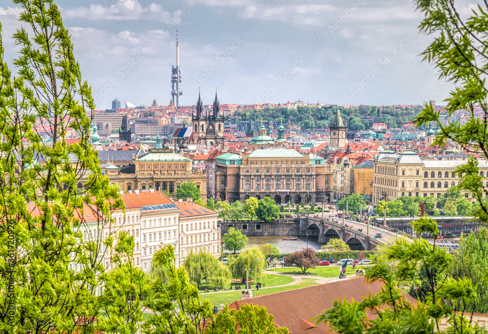 Summer sunny landscape of Prague. Ancient architecture and the Vltava river