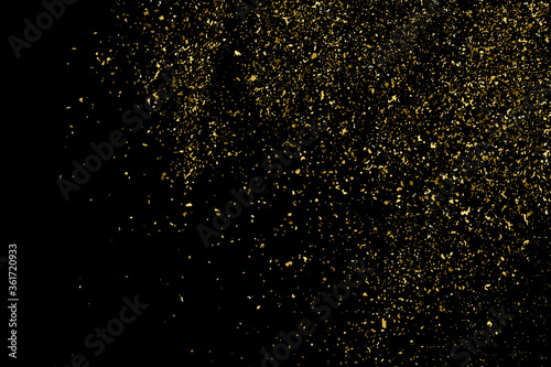 Gold glitter texture isolated on black. Amber particles color. Celebratory background. Golden explosion of confetti. Design element. Digitally generated image. Vector illustration, EPS 10.