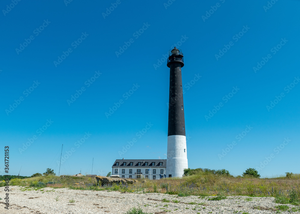 Sightseeing of Saaremaa island in sunny clear day . Sorve lighthouse, Saaremaa island, Estonia