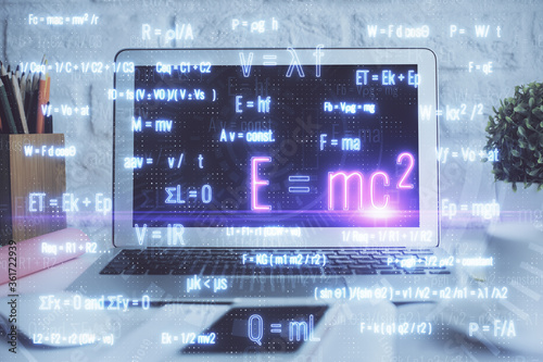 Desktop computer background and formula hologram writing. Double exposure. Education concept.