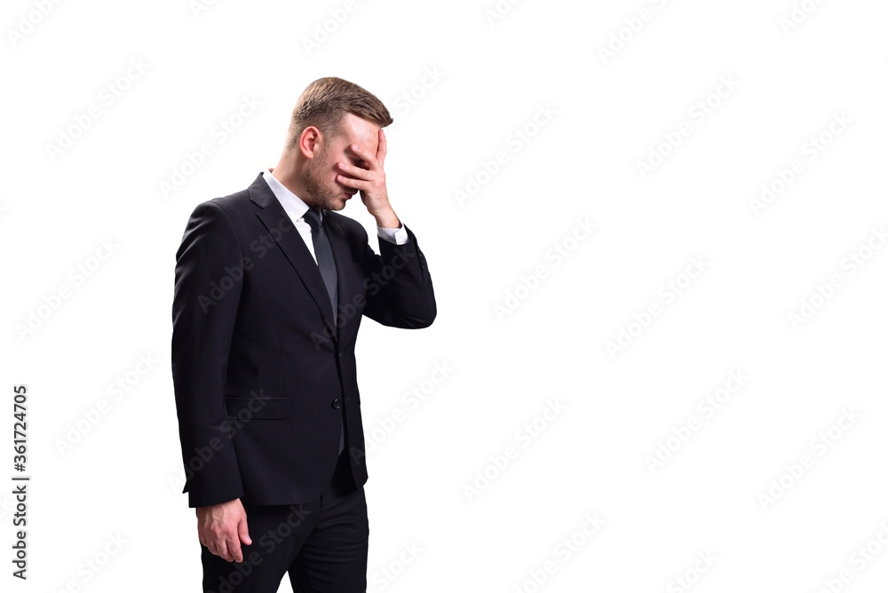 A business man in a suit, the Manager failed and covered his face with his hand, business concept, isolated on a white background A business man in a suit, the Manager failed and covered his face with his hand, business concept, isolated on a white background