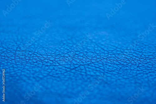 Close up of natural blue leather background. 