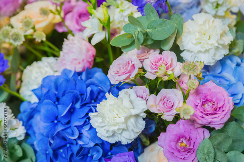 Colorful beautiful flowers bouquet at studio  flower shop - close up view. Floristry  romantic  holiday  birthday  valentine day  wedding  celebration concept