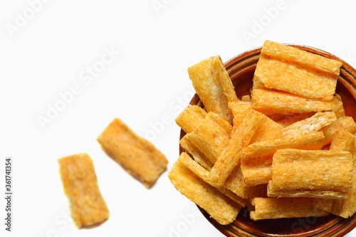 Fotografie Baked multigrain snack barbeque flavor isolated on white background