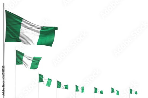 pretty many Nigeria flags placed diagonal isolated on white with space for your text - any holiday flag 3d illustration.. photo