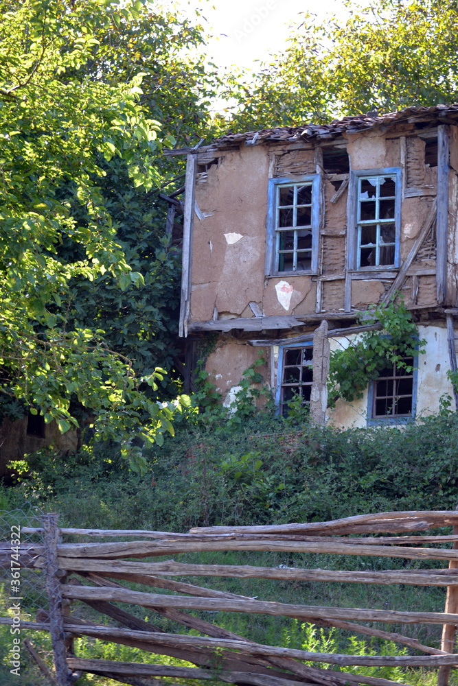 An old and abandoned house in the forest.