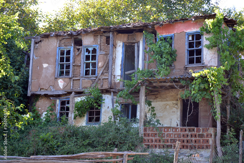 An old and abandoned house in the forest.
