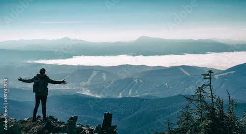 Photos Happy hiker winning reaching life goal, success, freedom and happiness, achievement in mountains