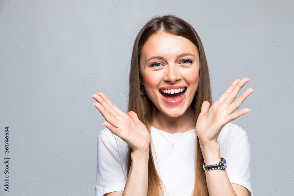 Beautiful woman smiling with open mouth and open palms isolated on white background Beautiful woman smiling with open mouth and open palms isolated on white background