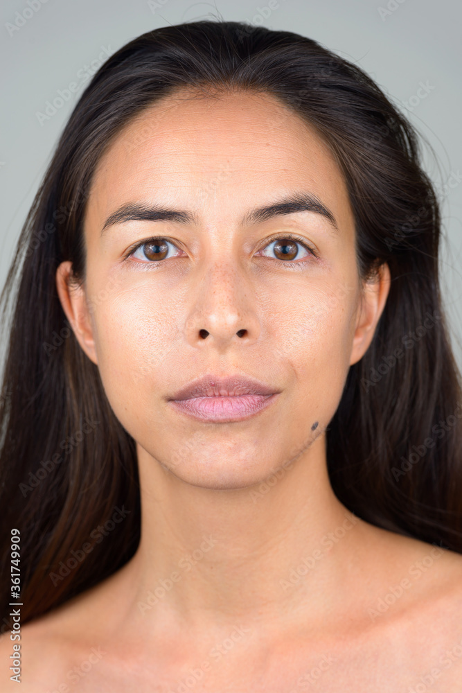 Face of beautiful multi ethnic woman looking at camera Face of beautiful multi ethnic woman looking at camera