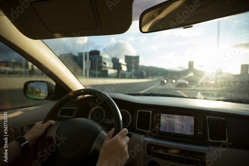 Driving car on sunrise highway